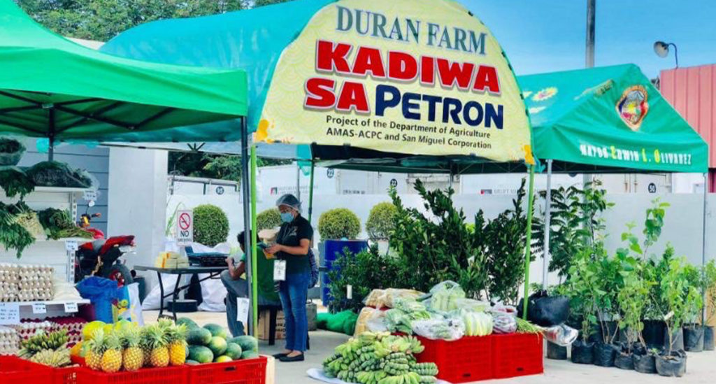 Kadiwa sa Petron tent displaying various fruits and vegetables