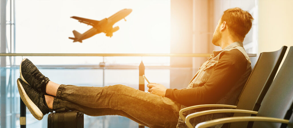 man waiting on airport